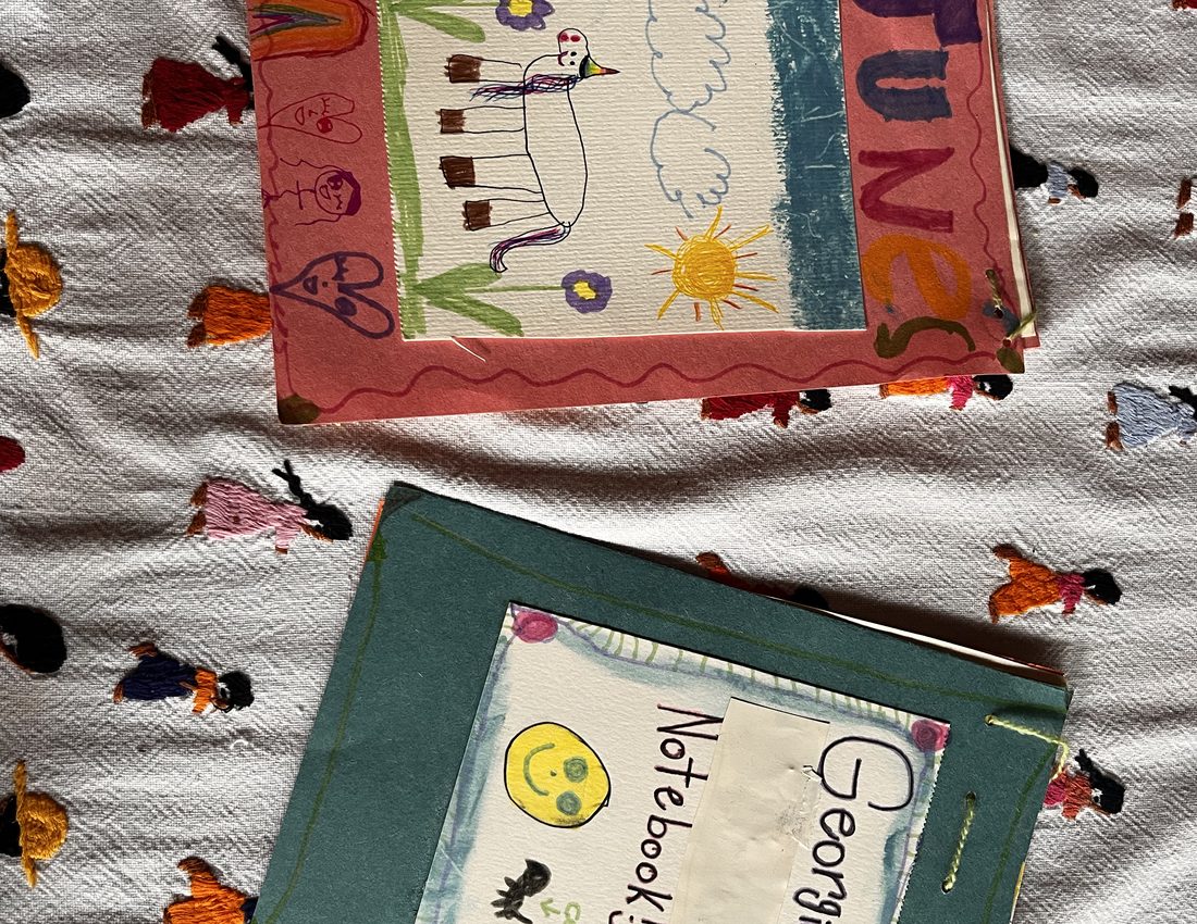Handmade holiday journals a child kept during their stay