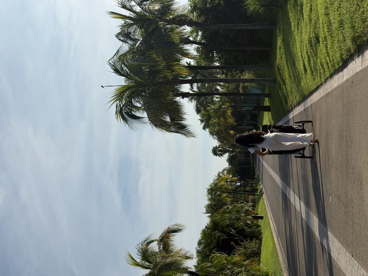 Stroller among palm trees in Punta Mita